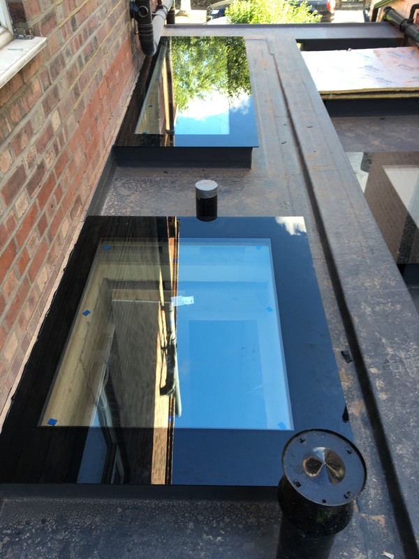 Multiple flat roof skylights on extension in New Cross Gate